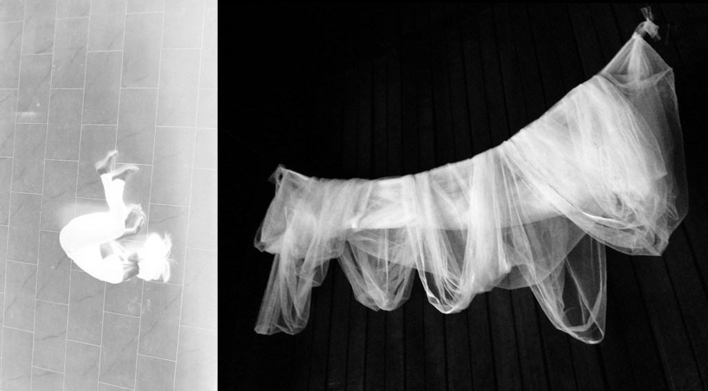 Hanging f/olds ©Susan Sentler, a photographic diptych of a human in a folded position lying on the floor at maximum exposure paired with a draped white mosquito netting against a black background.